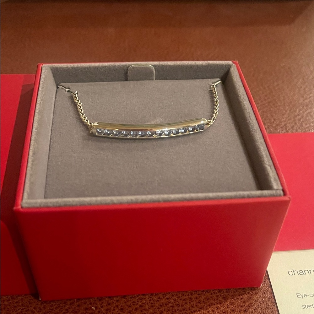 New with tags! Red Envelope Sterling Silver Bracelet with Blue stones.